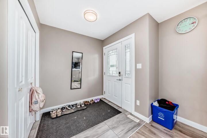 Property Photo:  12833 123 Street NW 1  AB T5L 0J4 