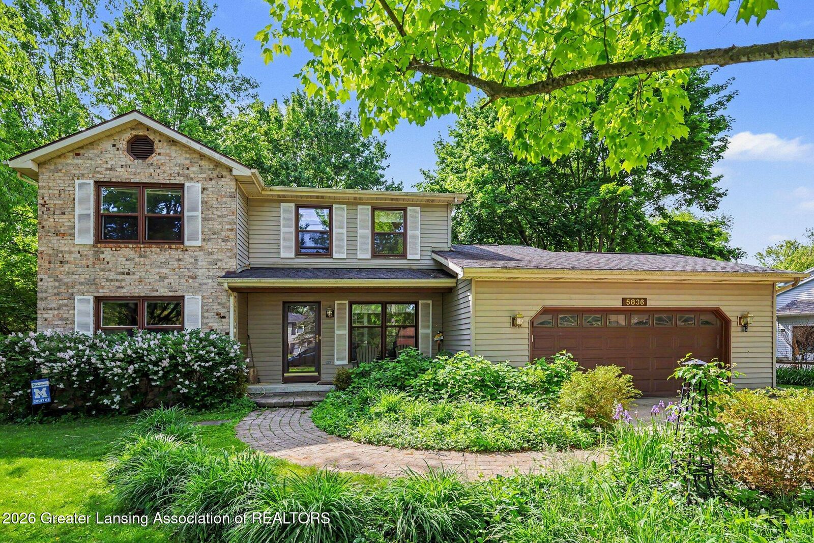 Property Photo:  5836 Wood Valley Drive  MI 48840 