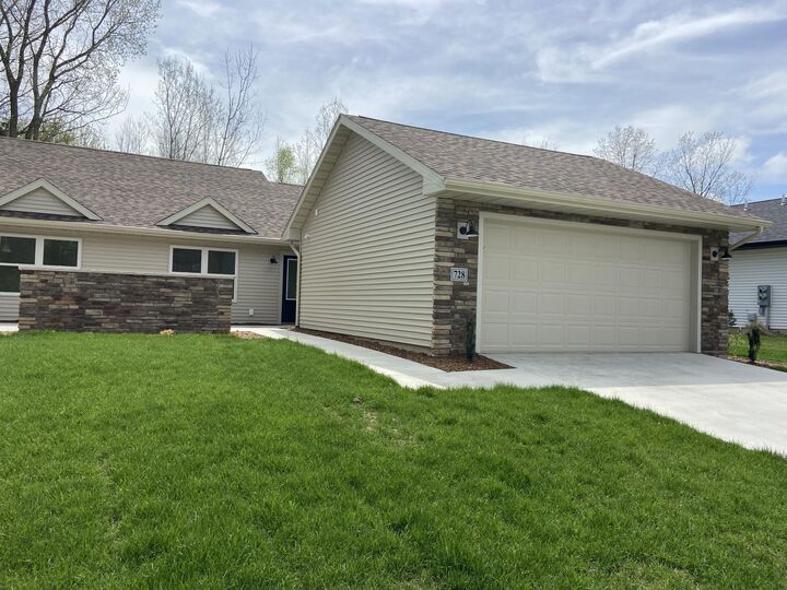Property Photo:  728 Violet Way  MI 49085 
