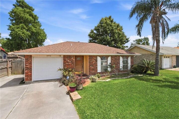 Property Photo:  404 Bertolino Drive  LA 70065 