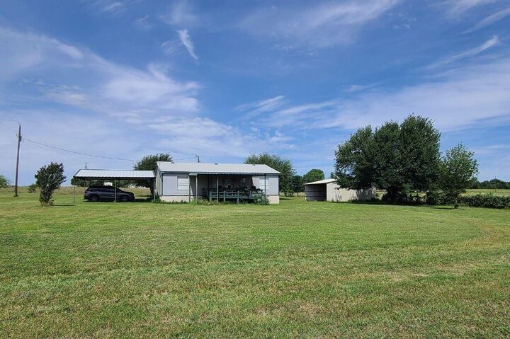 Property Photo:  1244 County Road 4680  TX 76023 