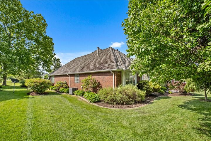 Property Photo:  18 W Champions Boulevard  AR 72758 