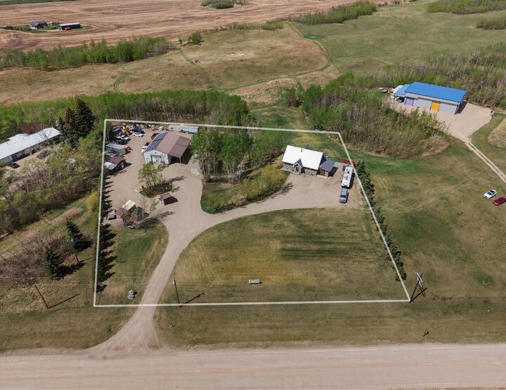Property Photo:  30-36006 Highway 2 Service Road South  AB T4G 0G6 