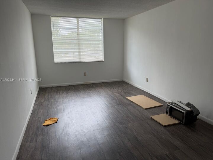 Property Photo: 492 NW 165th St Rd C-209 FL 33169