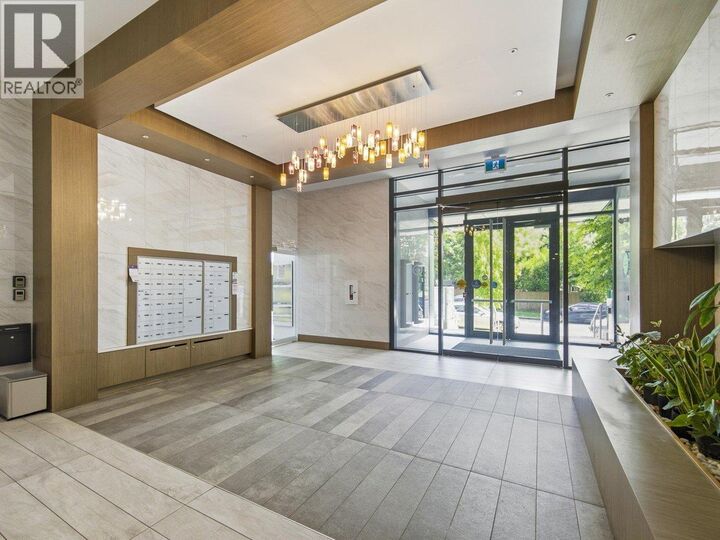 Property Photo:  5693 Elizabeth Street 402  BC V5Y 3K1 