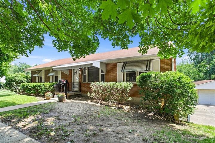 Property Photo:  3113 S Scott Avenue  MO 64052 
