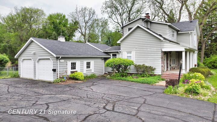 Property Photo:  5501 Calkins Road  MI 48532 