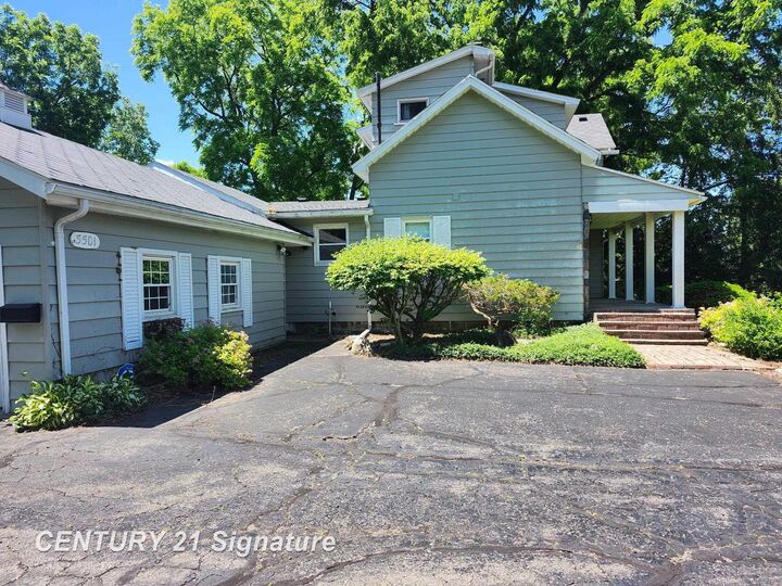 Property Photo:  5501 Calkins Road  MI 48532 
