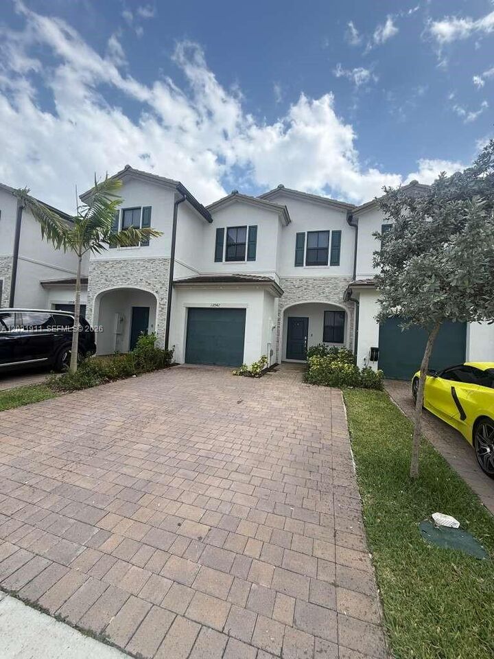 Property Photo:  12942 SW 231st St 12942  FL 33170 