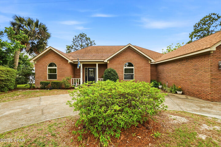 Property Photo:  6303 Palm Court  FL 32408 