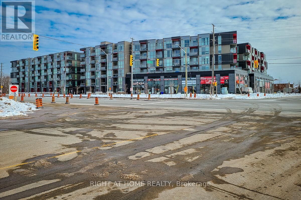 Property Photo:  5260 Dundas St Street West 306  ON L7R 3X4 