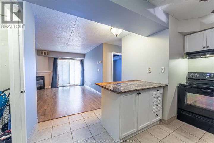 Property Photo:  1323 Langlois Avenue 105  ON N8X 4L8 