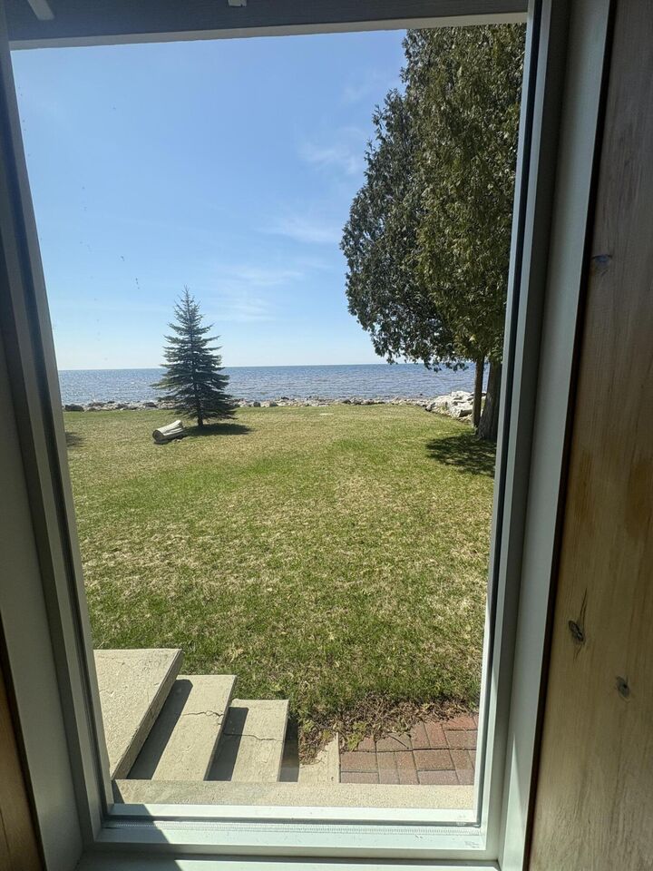 Property Photo:  W11897 Middle Beach Rd  MI 49762 