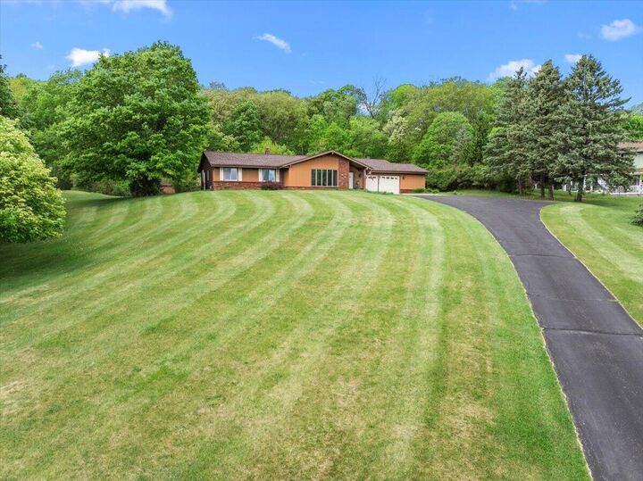Property Photo: 3455 Birnamwood Dr WI 53086