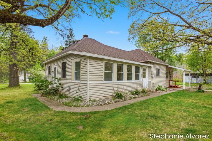 Property Photo:  1560 E McMillan Road  MI 49445 