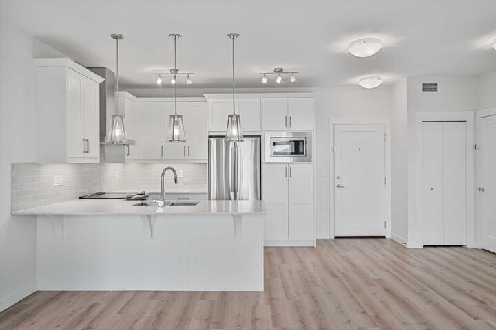 Property Photo:  522 Cranford Drive SE 2409  AB T3M 2L7 
