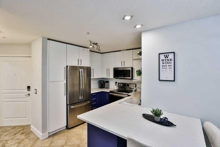 Property Photo:  5115 Richard Road SW 211  AB T3E 7M7 