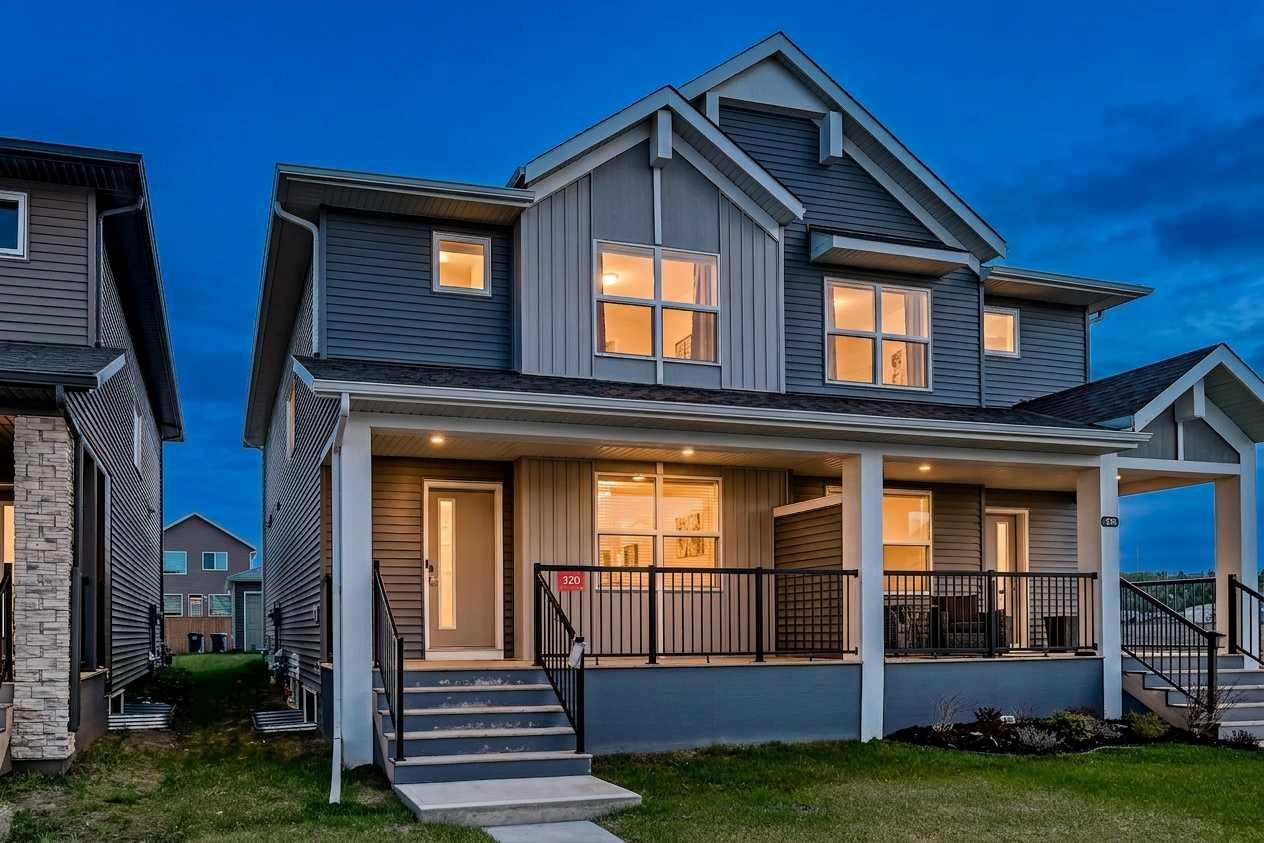 Property Photo: 326 Creekside Boulevard SW AB T2X 4Y1