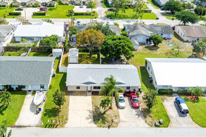 Property Photo: 8997 SE Sandy Lane FL 33455