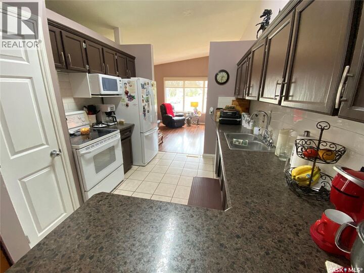 Property Photo:  2 544 Circlebrooke Drive  SK S3N 2T4 
