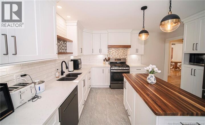 Property Photo: 171 Sunset Drive NB E3A 1A2