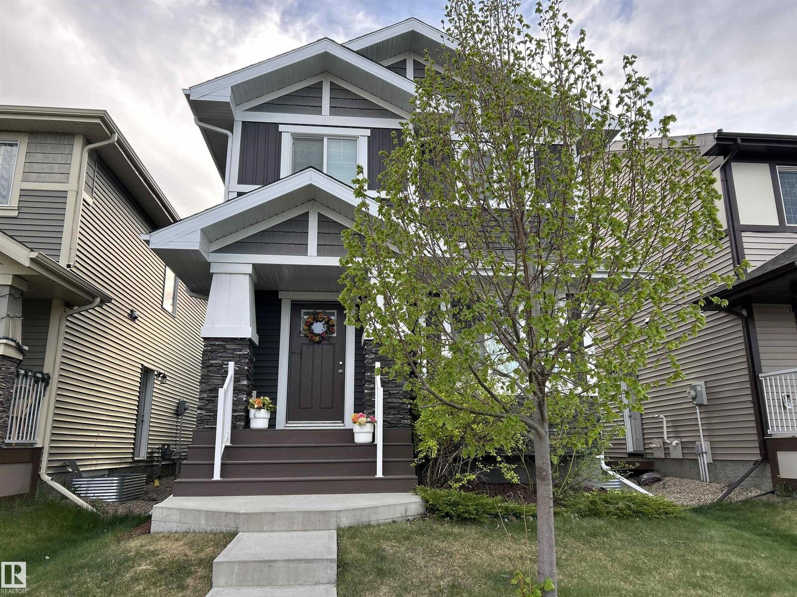 Property Photo:  8952 218 Street NW  AB T5T 4R8 