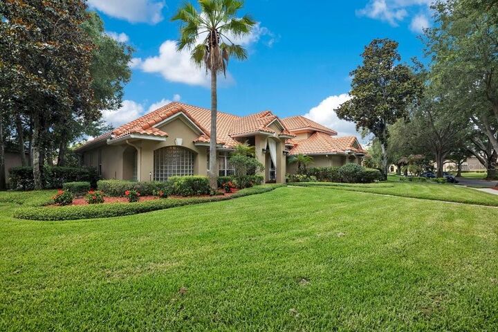 Property Photo: 7718 Debeaubien Drive FL 32835