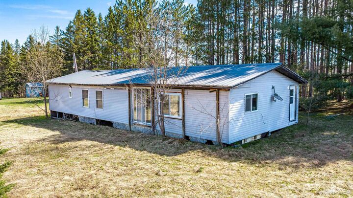 Property Photo:  35698 Tapiola Road  MI 49916 