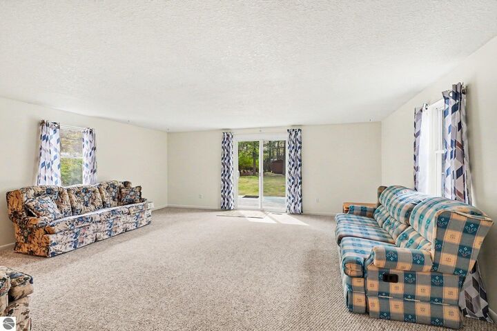 Property Photo:  5603 Cedar Lake Road  MI 48750 