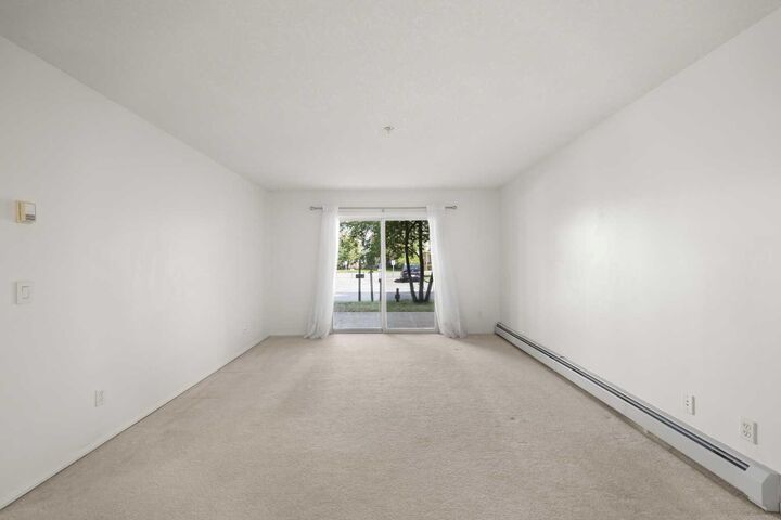 Property Photo:  20 Harvest Rose Park NE 2106  AB T3K 4Z1 