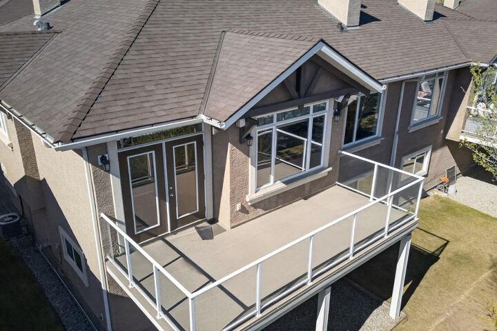 Property Photo: 14 Discovery Woods Villas SW AB T2H 5A6