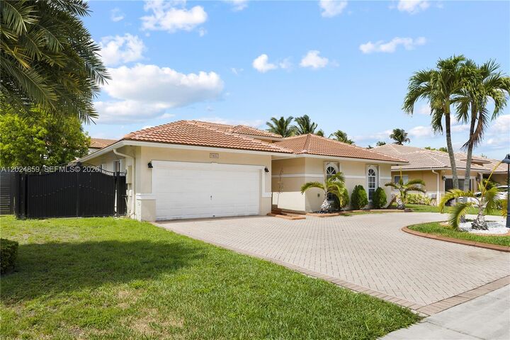 Property Photo:  7831 NW 160th Ter  FL 33016 