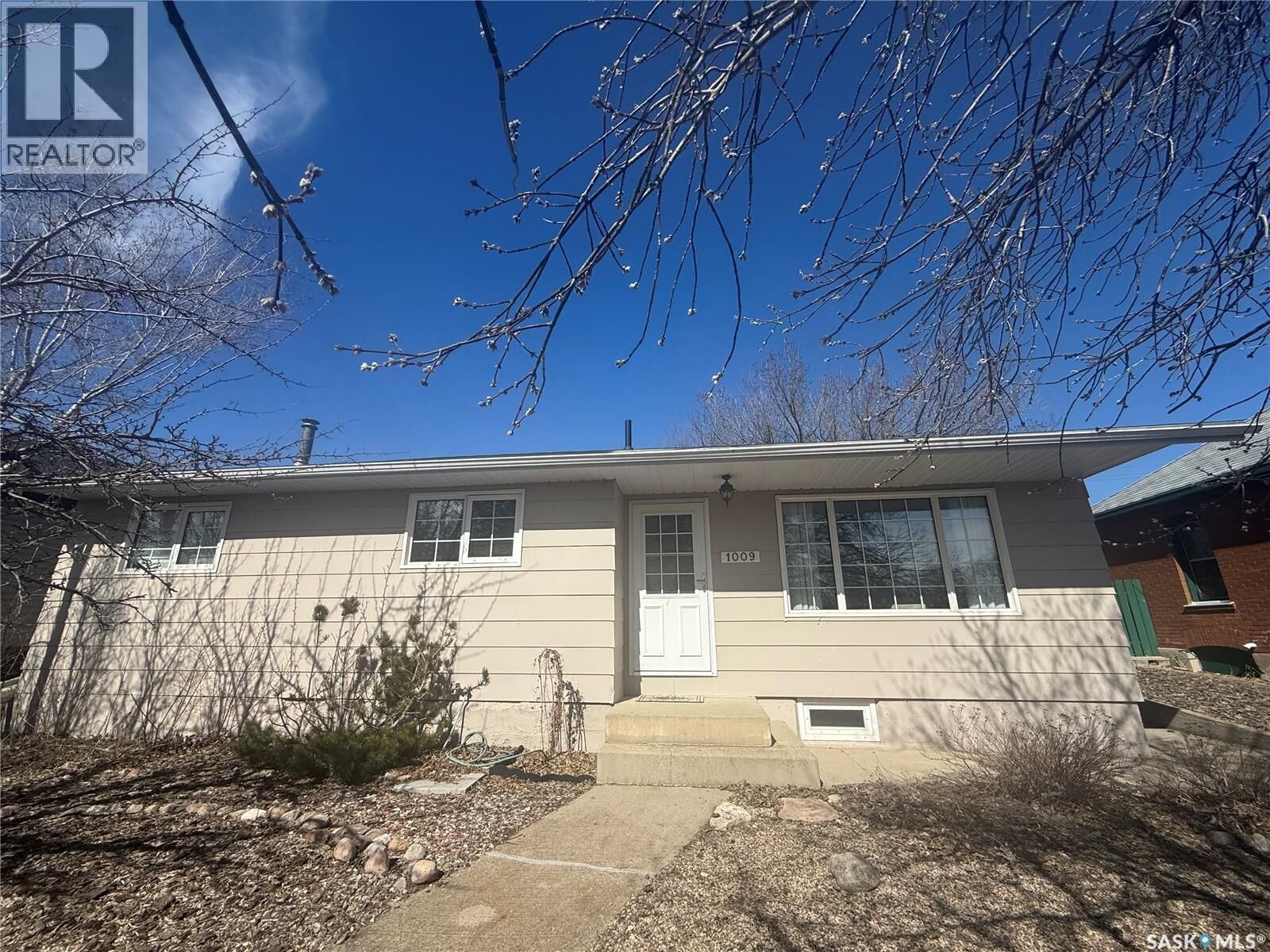 Property Photo:  1009 First Street  SK S4A 0G7 