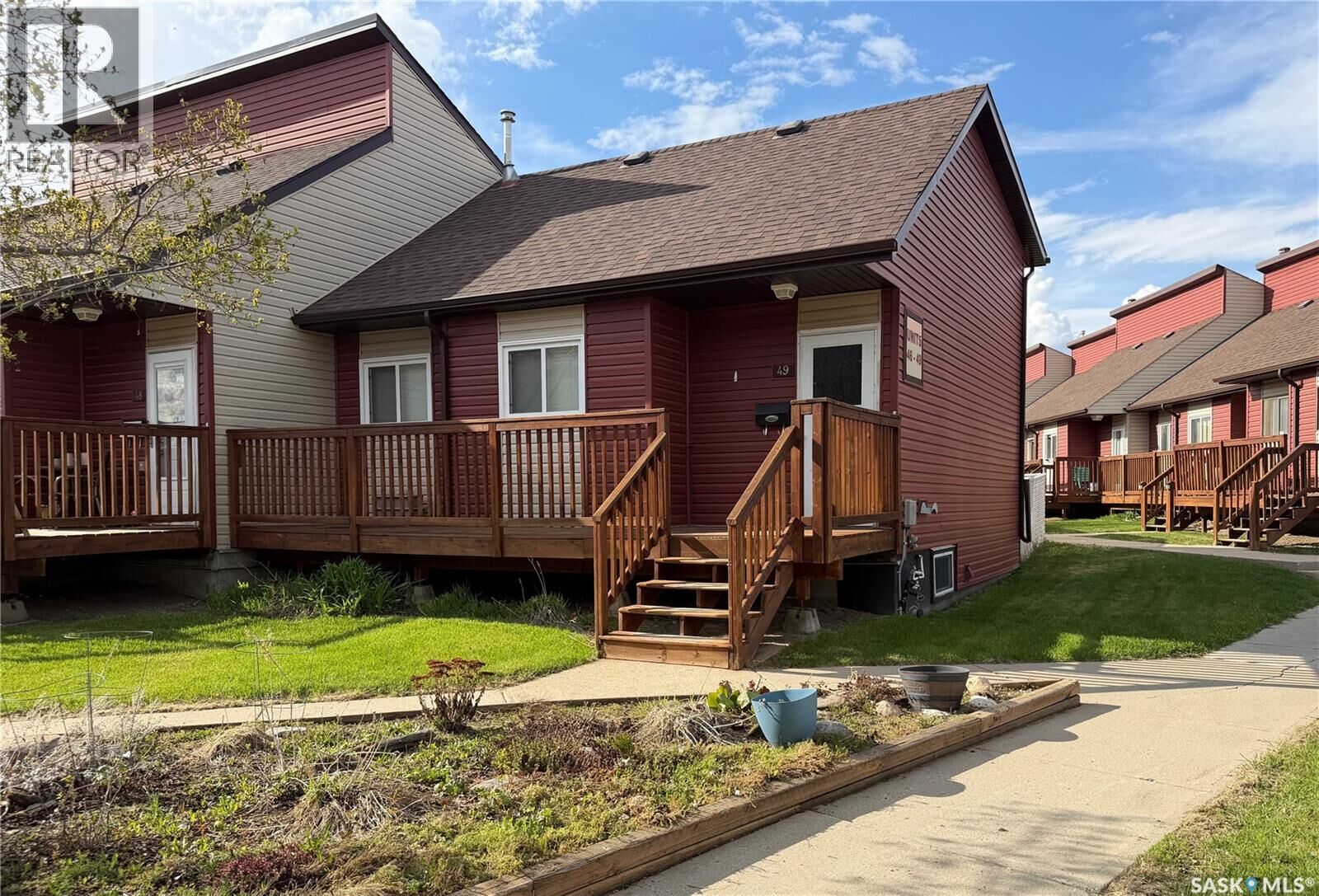 Property Photo:  49 331 Pendygrasse Road  SK S7M 4R3 