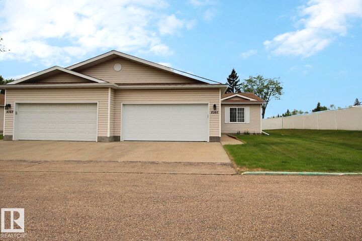 Property Photo:  8146 27 Avenue NW  AB T6K 4C9 