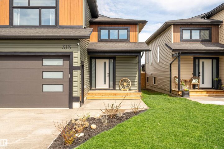 Property Photo: 318 Waterton Way AB T9M 0L4