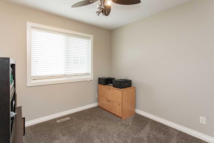 Property Photo: 101 Coachman Way AB T4M 0B4