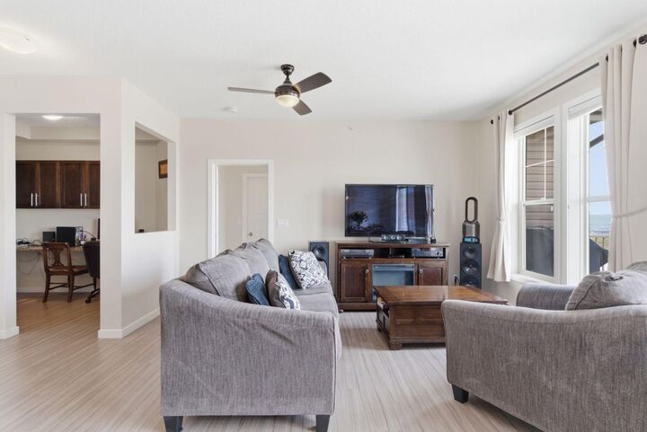 Property Photo: 207 Sunset Drive 408 AB T4C 0H8