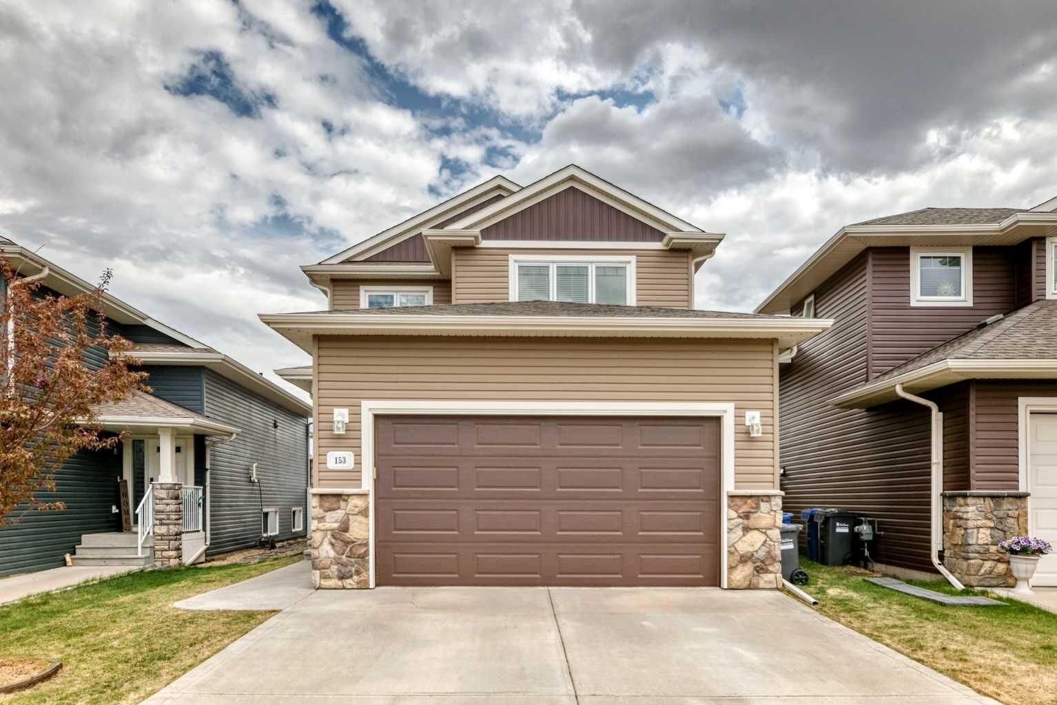 Property Photo: 153 Van Slyke Way AB T4R 0N7