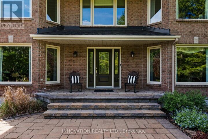 Property Photo: 1410 Sherruby Way ON K2W 1B1
