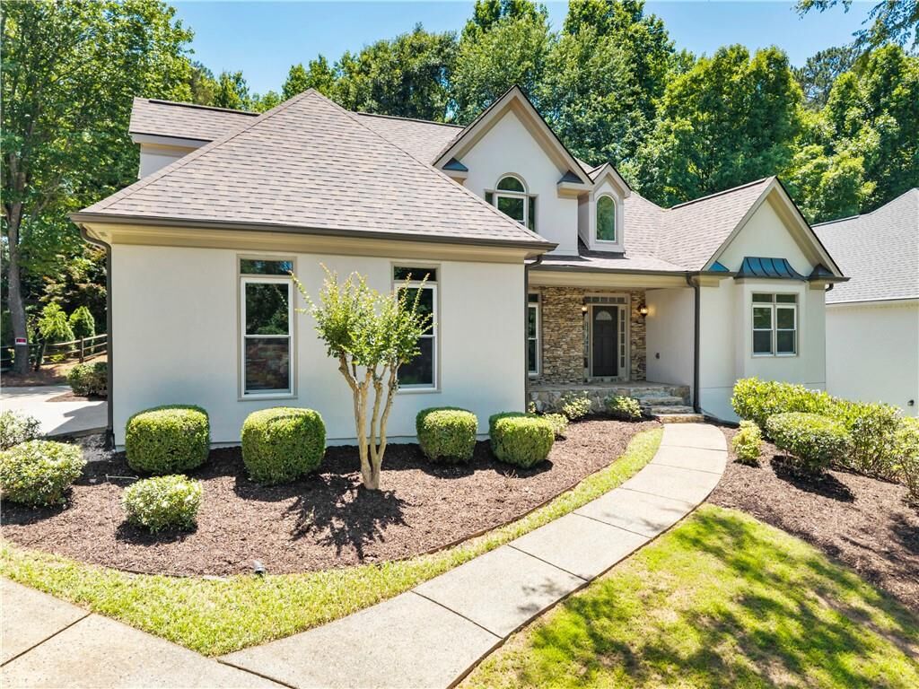 Property Photo: 9890 Groomsbridge Road GA 30022