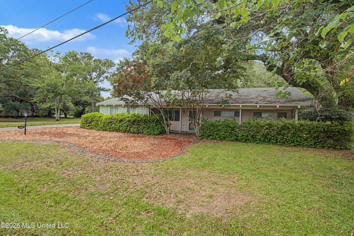Property Photo:  6621 Golf Club Drive  MS 39525 