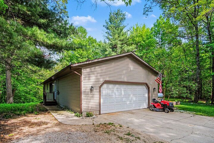 Property Photo:  5858 Chaz Drive  MI 49329 