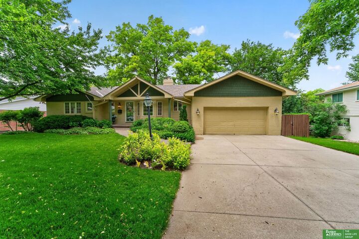 Property Photo:  706 J E George Boulevard  NE 68132 