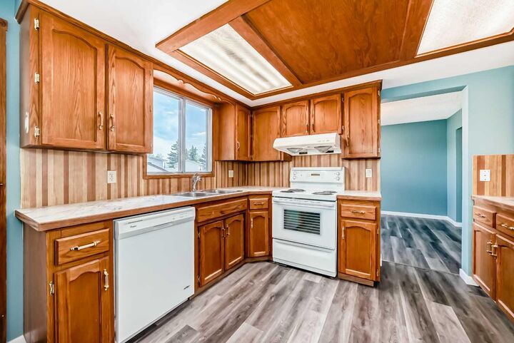Property Photo: 4308 55 Street NE AB T1Y 4B7