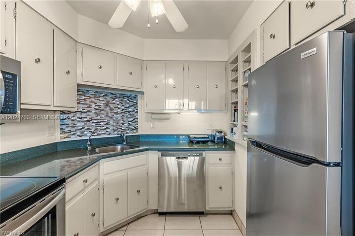 Property Photo:  5 Bluebill 403  FL 34108 