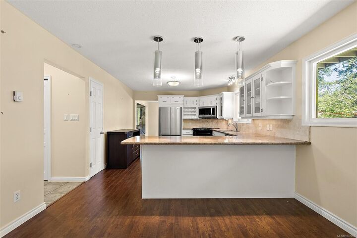 Property Photo: 1094 Sluggett Rd BC V8M 1J1