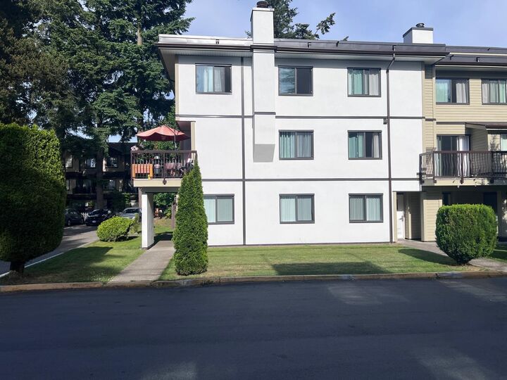 Property Photo: 7162 133A Street 104 BC V3W 7Z9