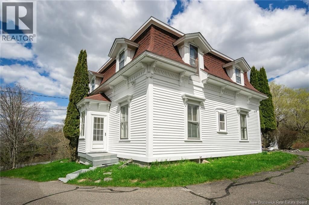 Property Photo:  697 Bay Street  NB E2M 7L6 