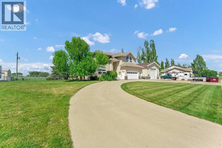 Property Photo: 190014 12 Street West AB T1R 1C7